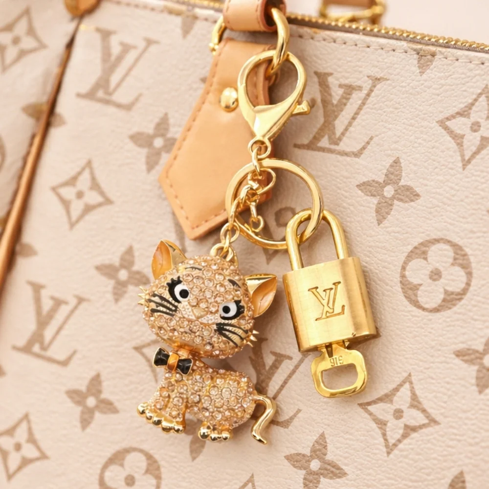 Authentic Louis Vuitton Lock & Key with unbranded Cat Bagcharm, Keycharm 022826